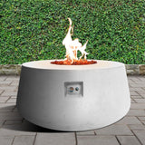 Stonelum Indiana 01 47-Inch Round White Gas Fire Pit in a garden