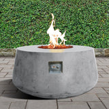 Stonelum Indiana 01 47-Inch Round White Gas Fire Pit in a garden