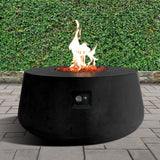 Stonelum Indiana 01 47-Inch Round Black Gas Fire Pit in a garden
