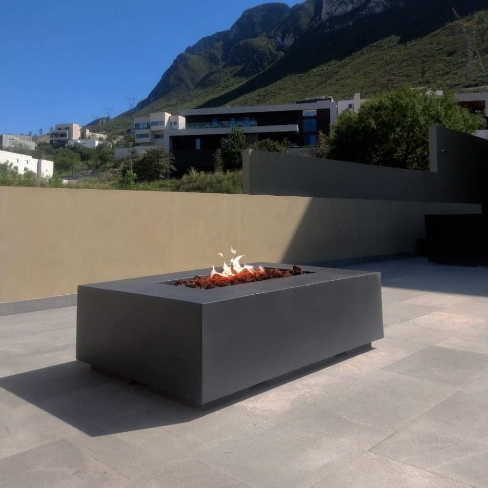 Stonelum Manhattan 01 Rectangular Graphite Fire Pit Table in a patio