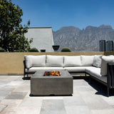 Stonelum Manhattan 01 Rectangular Graphite Fire Pit Table in a patio