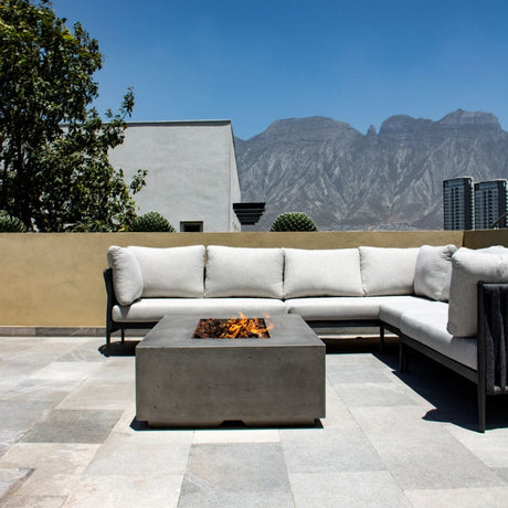 Stonelum Manhattan 01 Rectangular Graphite Fire Pit Table in a patio