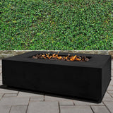 Stonelum Manhattan 01 Rectangular Fire Pit Table in a garden
