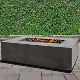 Stonelum Manhattan 01 Rectangular Graphite Fire Pit Table in a garden