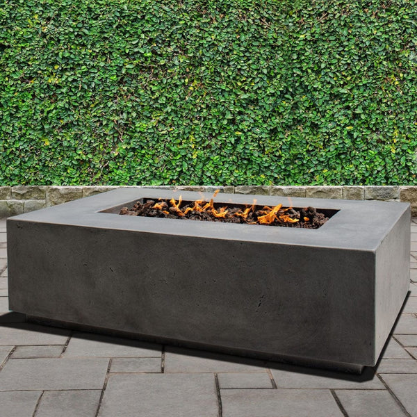 Stonelum Manhattan 01 Rectangular Graphite Fire Pit Table in a garden