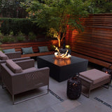 stonelum praga 1 square black gas fire pit on a cozy patio