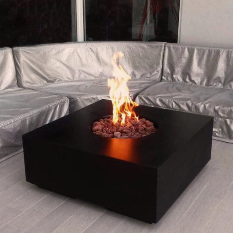 stonelum praga 1 square black gas fire pit with chairs around it