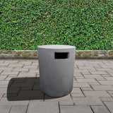 round gray tank cover in garden