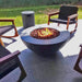 Stonelum Venecia 03 42-Inch Round Graphite Fire Bowl with chairs around it