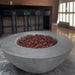 Stonelum Venecia 03 42-Inch Round Graphite Fire Bowl at a cafe