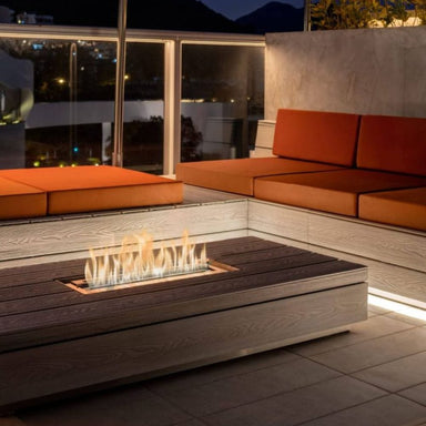 The Bio Flame 24-Inch Smart Ethanol Burner installed on a coffee table