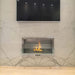 The Bio Flame 38-Inch Firebox Stainless Steel Ethanol Fireplace on a marble wall