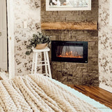 Touchstone Sideline 28-Inch recessed electric fireplace installed in a room