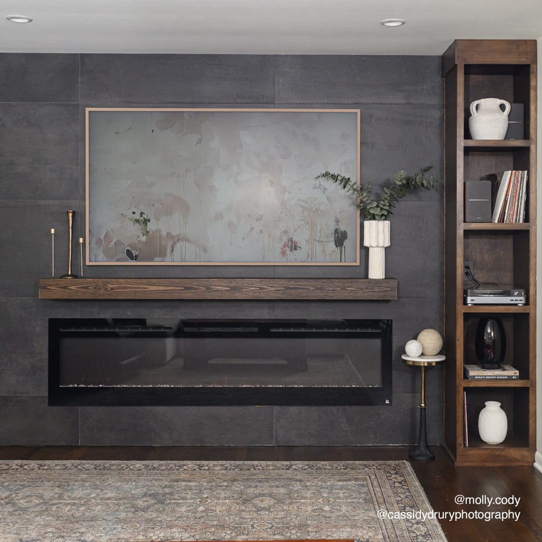 Touchstone Sideline 84-Inch recessed electric fireplace installed in a room