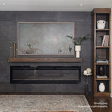 Touchstone Sideline 84-Inch recessed electric fireplace installed in a room