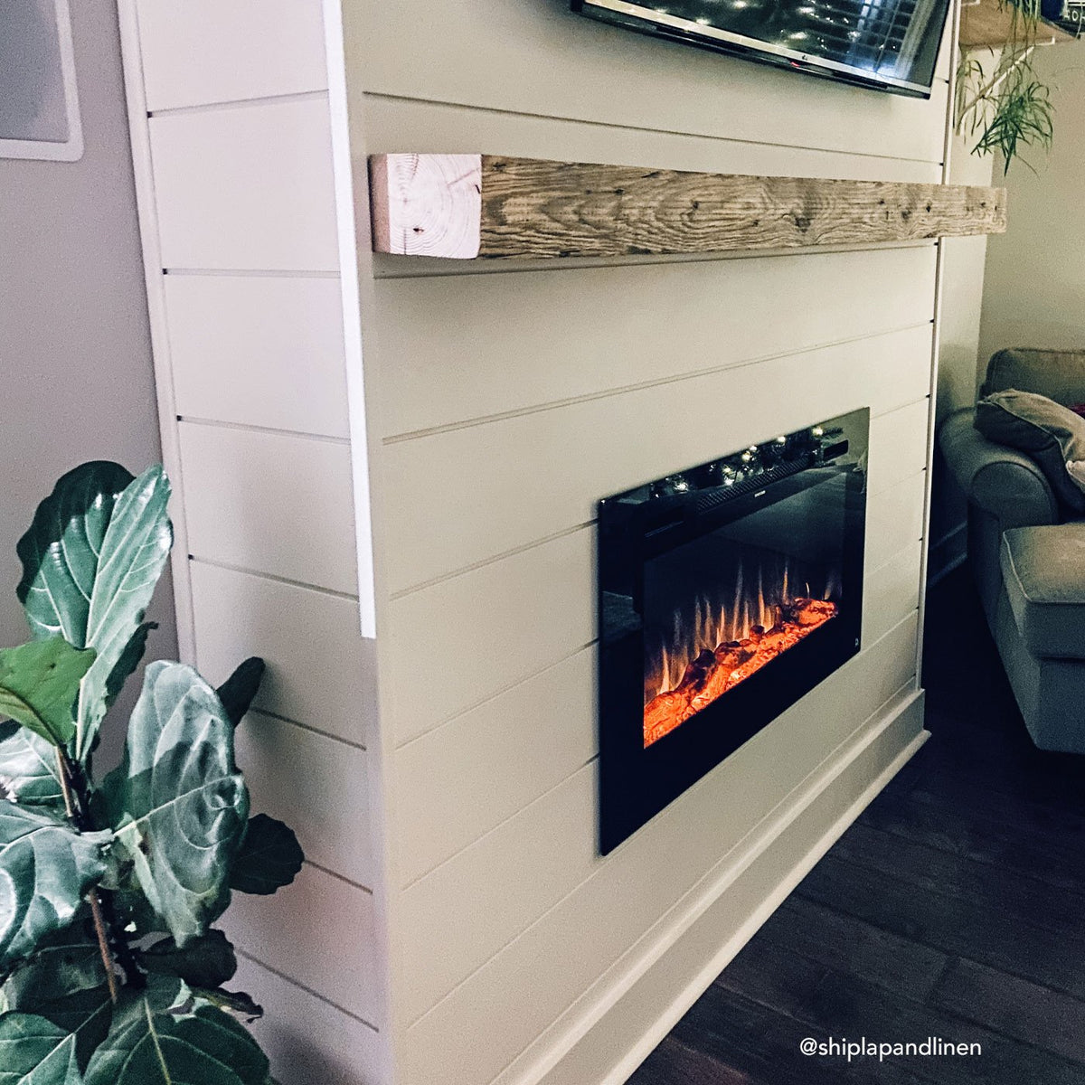 Touchstone Sideline 40-Inch recessed electric fireplace installed in a room
