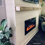 Touchstone Sideline 40-Inch recessed electric fireplace installed in a room