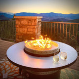 enjoying a glass of white wine by the wine barrel dude coffee table gas fire pit table