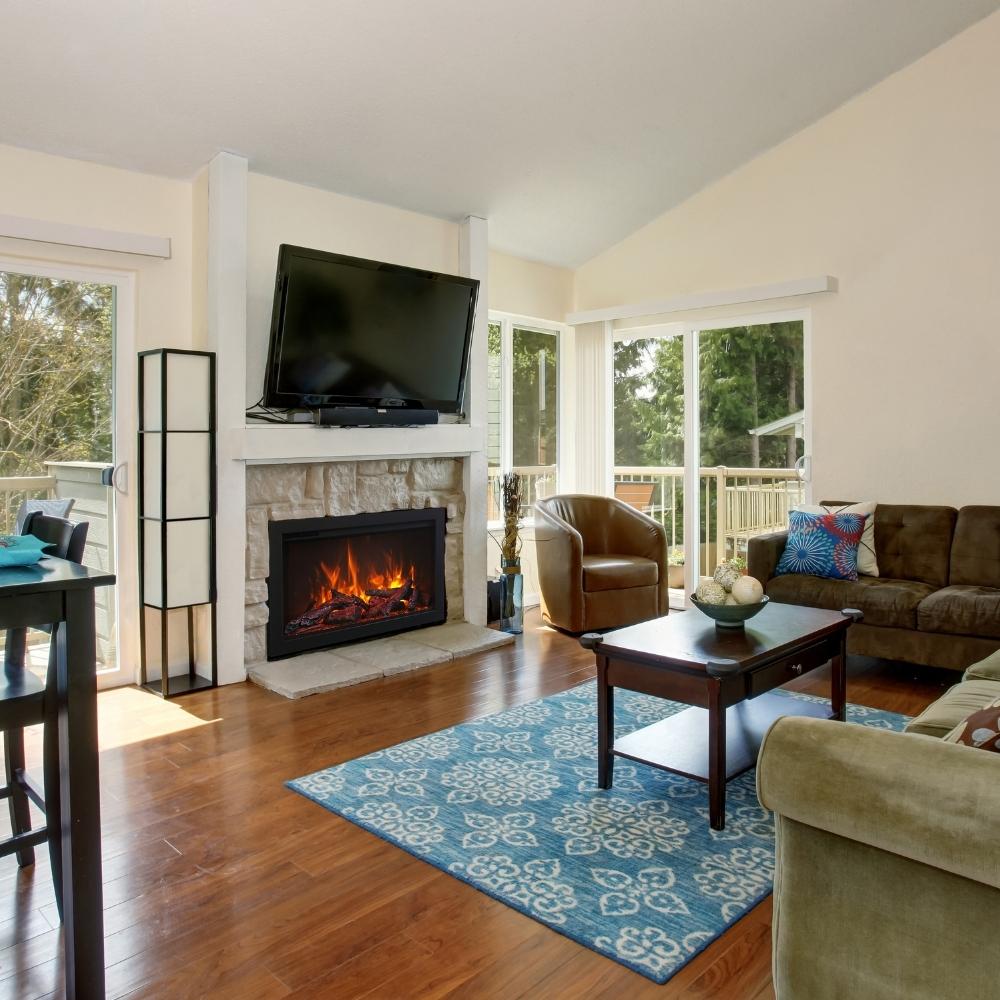 Amantii Traditional 44" Built-in Electric Fireplace with Custom Stone Mantel in Living Room