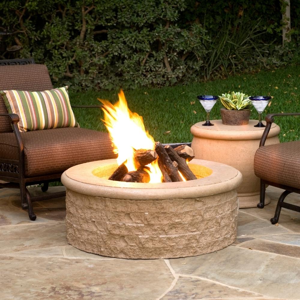 American Fyre Designs Chiseled 39” Round Gas Fire Pit in Patio