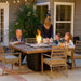 Family Dining Outdoors on Fire Pit Dining Table