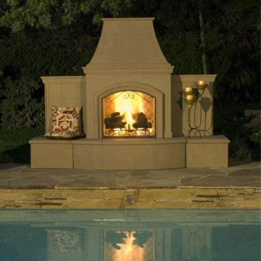American Fyre Designs Grand Phoenix 113-Inch Recessed Hearth Outdoor Gas Fireplace in Cafe Blanco by the Pool