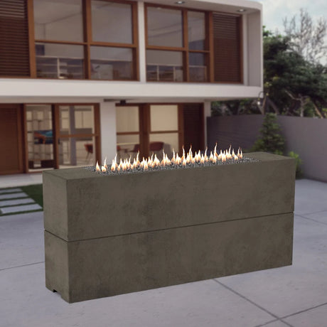 American Fyre Designs Milan Tall Smoke Fire Pit Table in modern backyard