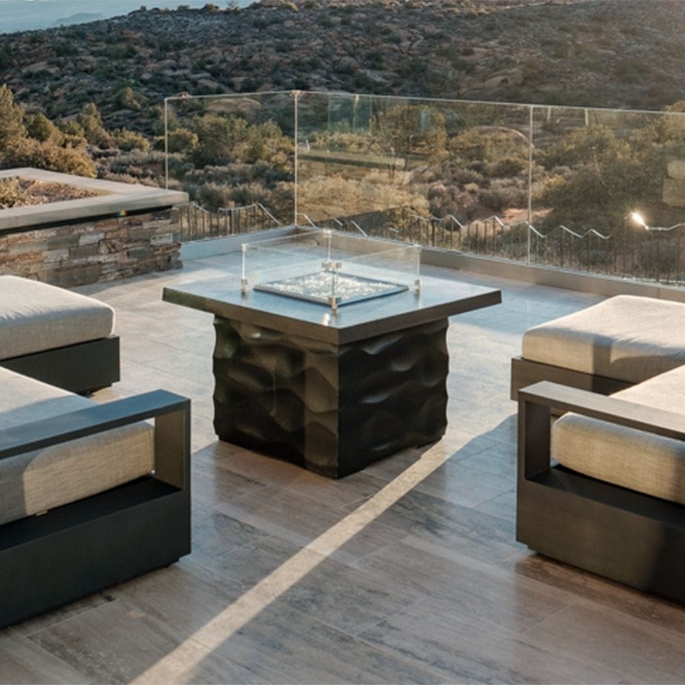 American Fyre Designs Voro Fire Pit Table in Outdoor Patio with Mountain View