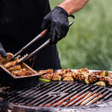 Cooking outdoors on Arteflame Classic 38-Inch Corten Steel Fire Pit with Storage