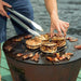 grilling pancakes and meat on the arteflame one series 20-inch fire pit