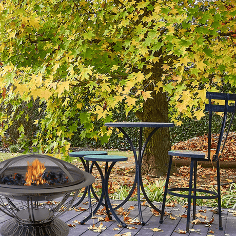 AZ Patio Heaters Scroll Design 30-Inch Round Fire Pit in a garden