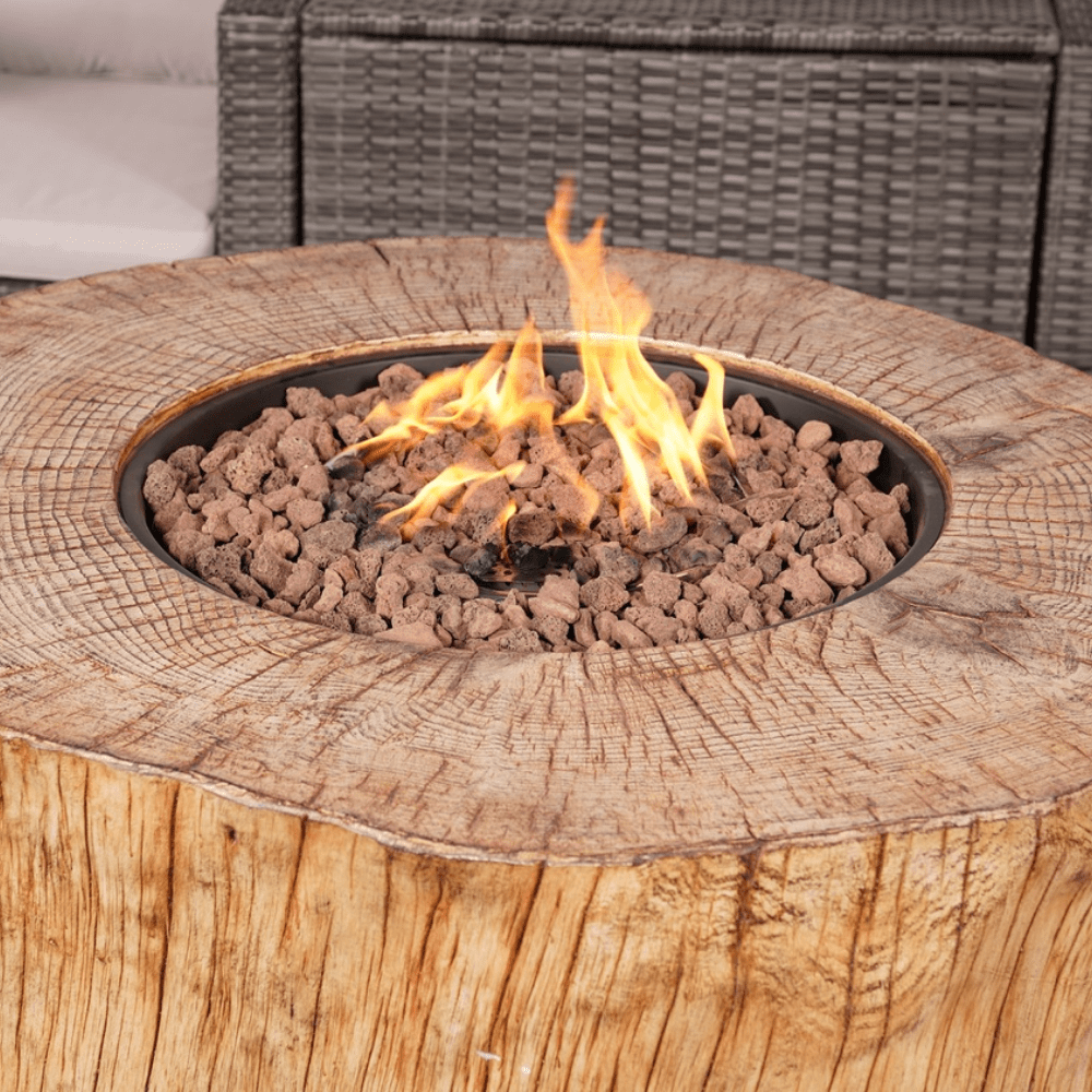 Close up of Direct Wicker Round Stainless Steel Firepit in Grain Pattern with Fire going