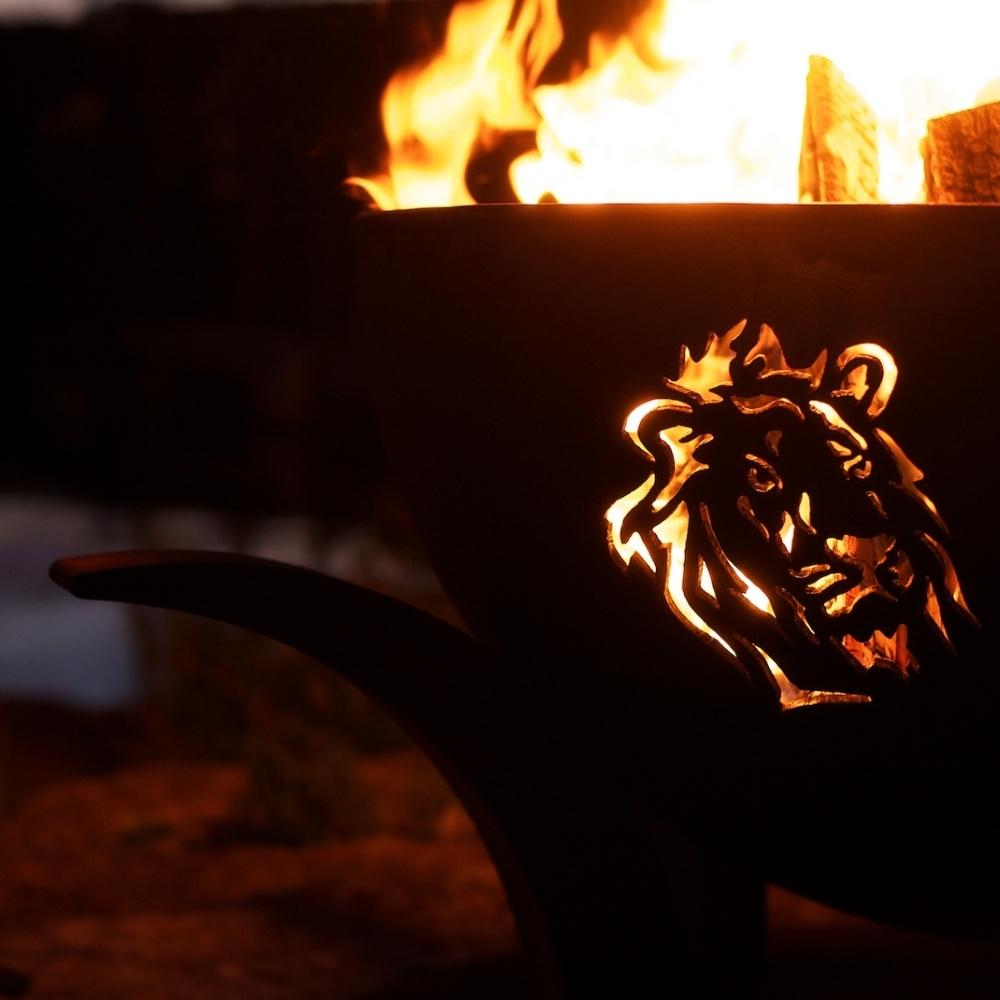 Lion Design of Fire Pit Art Africa's Big Five With Burning Logs