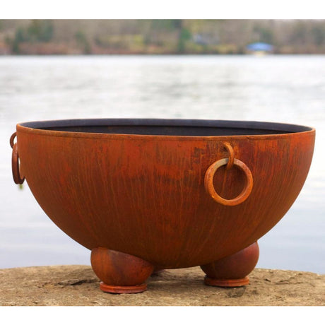 Fire Pit Art Nepal - 41" Handcrafted Carbon Steel Fire Pit (NP) Beside A Lake