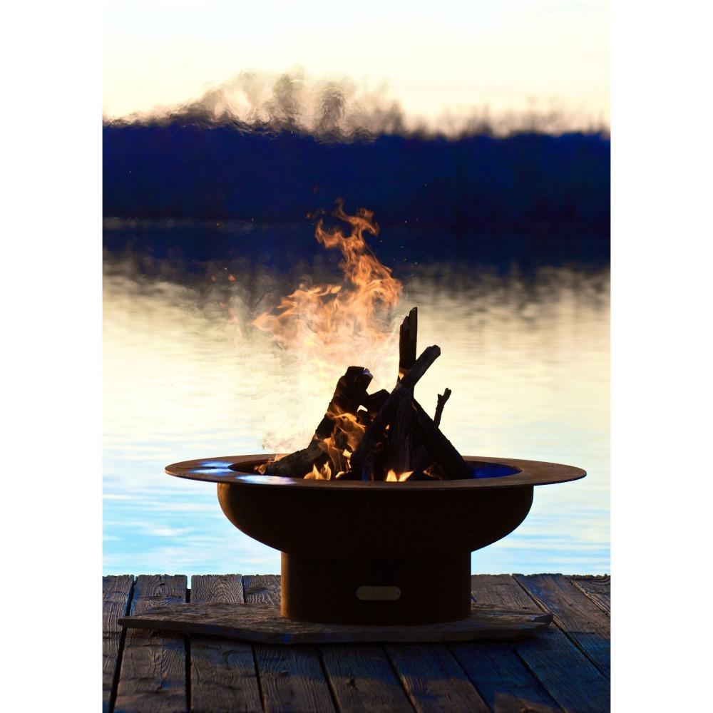 Fire Pit Art Saturn - 40" Handcrafted Carbon Steel Fire Pit In A Landscape Scenery