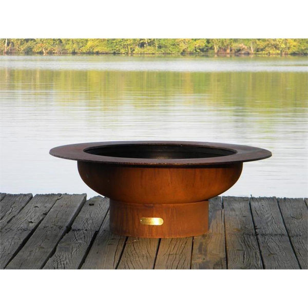 Empty Fire Pit Art Saturn Beside A Lake