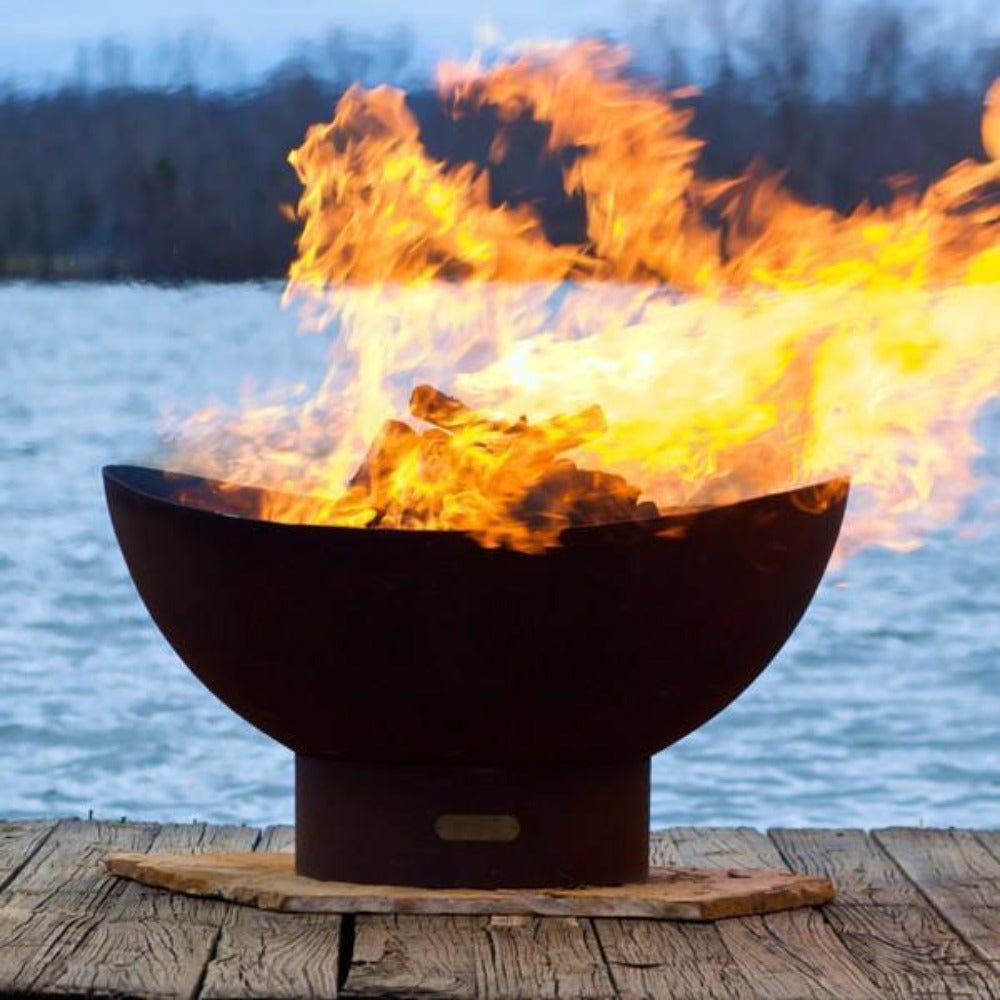 Fire Pit Art Scallop - 36" Handcrafted Carbon Steel Fire Pit  (SC) Beside A Lake