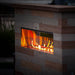 firegear kalea bay vent free outdoor gas fireplace at night