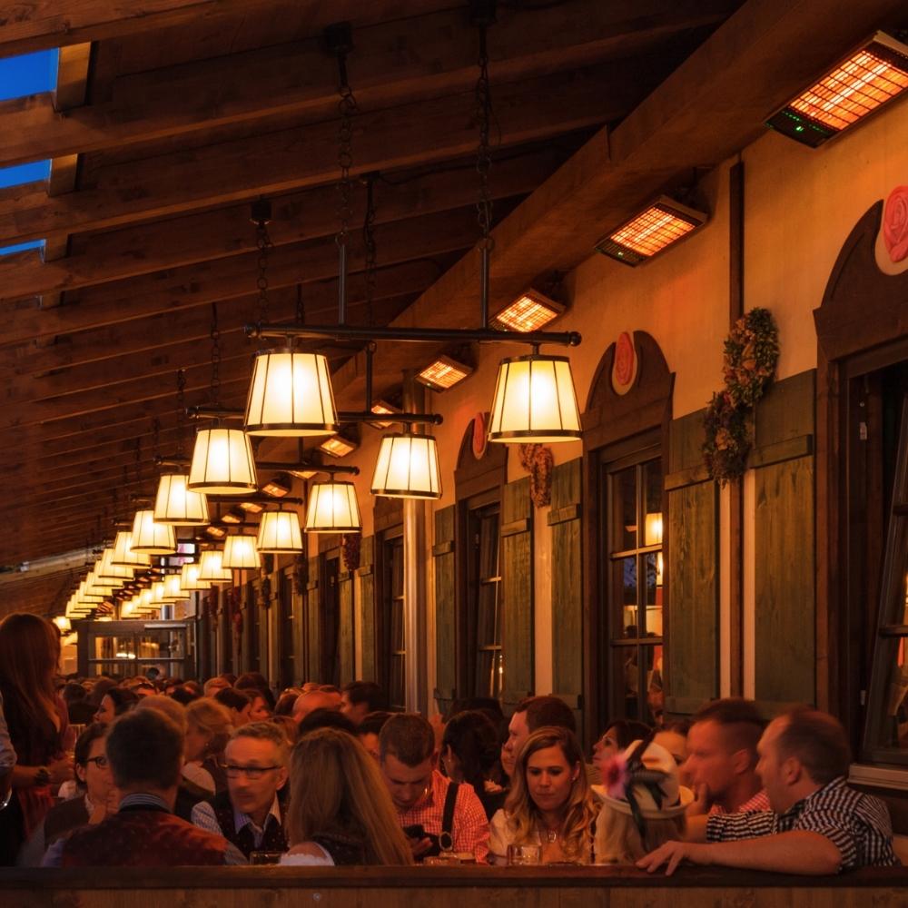 Heatscope Spot Black Electric Heaters in Covered Outdoor Dining Area