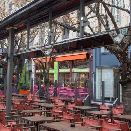 Heatscope Vision 65" Black Electric Heaters in Restaurant Outdoor Dining Area