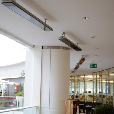 Heatscope Vision 65" Black Electric Heaters in Restaurant Dining Area