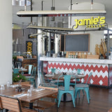 Heatscope Vision 65" Black Electric Heaters in Restaurant Dining Area