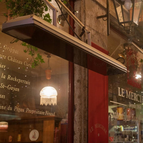 Heatscope Vision 65" Black Electric Heaters in Restaurant Outdoor Dining Area