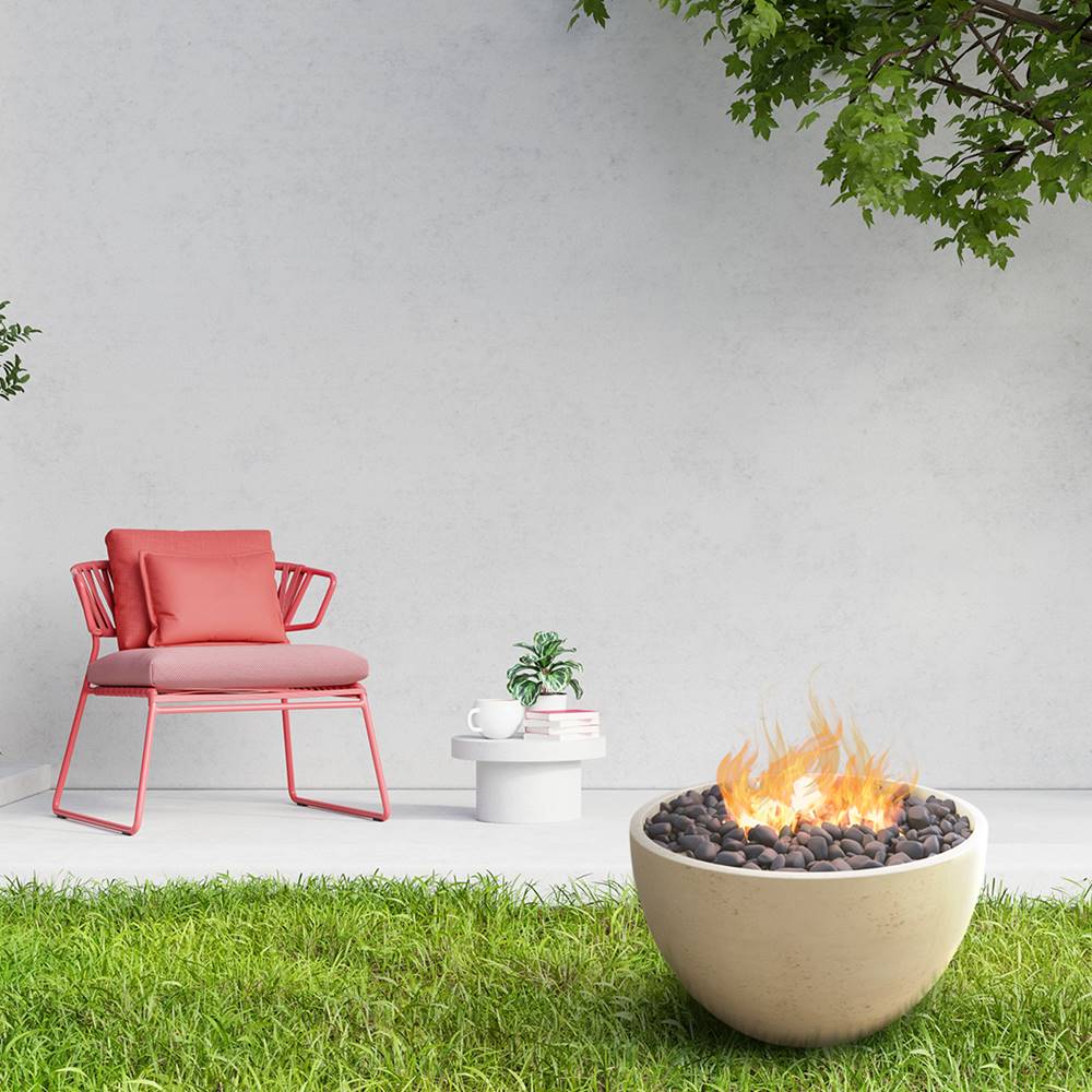 Modern Blaze 36-Inch Round Clamshell Concrete Fire Bowl in the garden