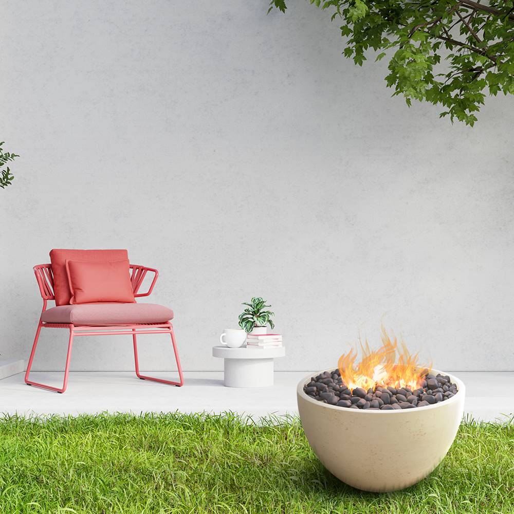 Modern Blaze 36-Inch Round Spanish White Concrete Fire Bowl in the garden