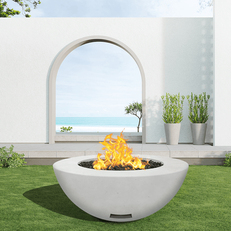 modern blaze round arctic fire bowl with smooth surface in a light outdoor setting