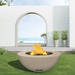 modern blaze round bone fire bowl with smooth surface in a light outdoor setting