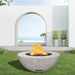 modern blaze round ivory fire bowl with textured surface in a light outdoor setting