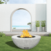 modern blaze round arctic fire bowl with textured surface in a light outdoor setting