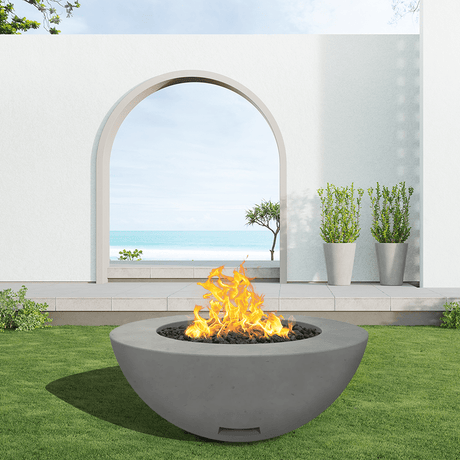 modern blaze round slate fire bowl with smooth surface in a light outdoor setting